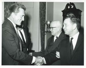 Carl Albert shaking hands with Kirk Douglas., 1950-01-01 - 1976-12-31