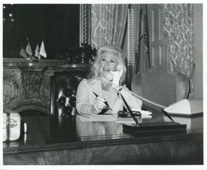 Ginger Rogers talking on the phone in an office. October 2, 1975, 1975-10-02