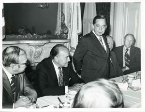Carl Albert, Gerald R. Ford, and two other men seated at a dinner table., 1950-01-01 - 1976-12-31