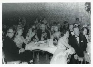 Several unidentified people seated at dinner tables., 1950-01-01 - 1976-12-31