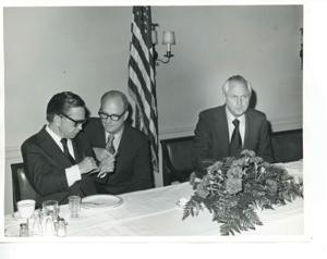 Carl Albert, Charles Ward, and David Hall seated at a dinner table., 1950-01-01 - 1976-12-31