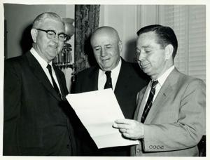 Carl Albert, Tom Steed, and Sam Rayburn looking at a document., 1950-01-01 - 1976-12-31