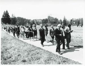Carl Albert with several others walking down a pathway during the House delegation trip. August 1975, 1975-08-04