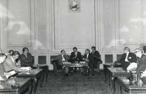 Carl Albert seated with several other men during the House delegation trip. August 1975, 1975-08-04