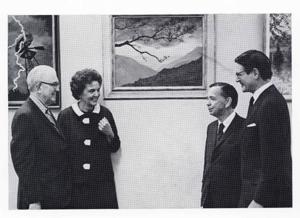 Carl Albert, Tom Steed, Elliot Richardson, and an unidentified woman standing together in an art gallery., 1950-01-01 - 1976-12-31