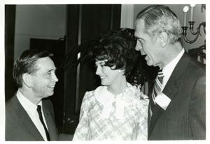 Carl Albert speaking with G. V. Montgomery and the Maid of Cotton, 1950-01-01 - 1976-12-31