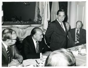 Carl Albert speaking to men seated at a dinner table. Gerald R. Ford is present., 1950-01-01 - 1976-12-31