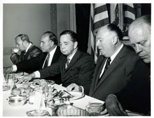 Carl Albert speaking to men seated at a dinner table. Gerald R. Ford is present., 1950-01-01 - 1976-12-31