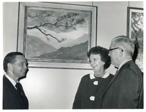 Carl Albert speaking with Tom Steed and an unidentified woman in an art gallery., 1950-01-01 - 1976-12-31