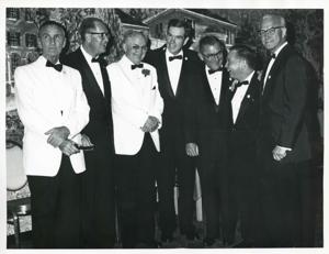 Carl Albert, Mike Mansfield, Wright Patman, George Mahon, Wilbur D. Mills, and two other men posing for a picture. They are dressed in formal attire., 1950-01-01 - 1976-12-31