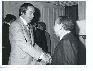 Carl Albert shaking hands with Johnny Bench, Cincinnati Reds baseball player. December 1976, 1976-12-01
