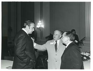 Carl Albert speaking with Olin Teague at reception for freshman 94th Congress. December 1, 1975, 1975-12-01