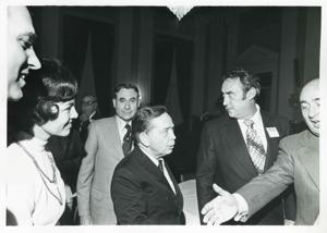 John McFall, Carl Albert and others at a reception for freshman members of the 94th Congress. December 1, 1975, 1975-12-01