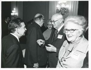 Carl Albert with unidentified people at a reception for freshman members of the 94th Congress. December 1, 1975, 1975-12-01