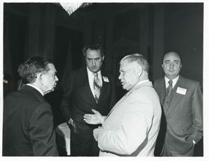 Carl Albert speaking with Olin Teague at a reception for freshman members of the 94th Congress. December 1, 1975, 1975-12-01