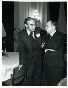 Carl Albert speaking with James C. Wright at a reception for freshman members of the 94th Congress. December 1, 1975, 1975-12-01