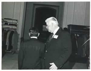 Carl Albert speaking with Thomas P. O&#39;Neill at a reception honoring freshman members of the 94th Congress. December 1, 1975, 1975-12-01