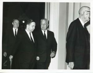 Hubert H. Humphrey, Carl Albert, Charles O. Halleck, and Carl Hayden walking down a corridor., 1950-01-01 - 1976-12-31