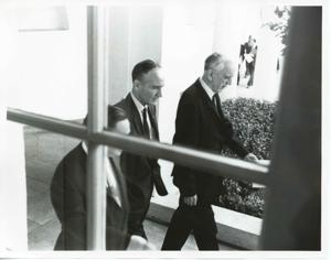 Carl Albert, Mike Mansfield, and John W. McCormack walking together outside., 1950-01-01 - 1976-12-31