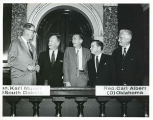 Carl Albert standing with several unidentified men., 1950-01-01 - 1976-12-31