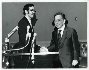 Carl Albert shaking hands with an unidentified man., 1950-01-01 - 1976-12-31
