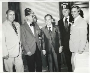 Carl Albert standing with members of the Capitol Hill Shrine Club., 1950-01-01 - 1976-12-31