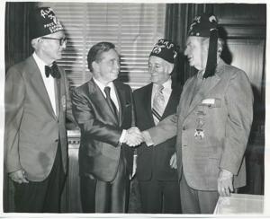Carl Albert standing with members of the Capitol Hill Shrine Club., 1950-01-01 - 1976-12-31