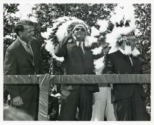 Carl Albert giving a speech at the Talimena Drive dedication. George Nigh and Dewey F. Bartlett are also present. July 1970, 1970-07-01