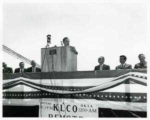 Carl Albert speaking at the Port Carl Albert dedication. Ed Edmondson is seated on the left. May 27, 1972, 1972-05-27