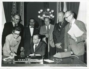 Presentation of $80,000 to Carl Albert for murals in Capitol. Fred Swengel and Gerald R. Ford are also present., 1950-01-01 - 1976-12-31
