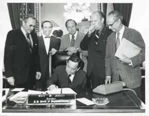 Presentation of $80,000 to Carl Albert for murals in Capitol. Fred Swengel and Gerald R. Ford are also present., 1950-01-01 - 1976-12-31