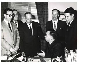 Carl Albert and two unidentified men looking at a map in office., 1950-01-01 - 1976-12-31