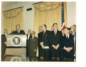 Gerald R. Ford talking with House Speaker Carl Albert and John Anderson at the end of a Potomac cruise aboard the presidential yacht Sequoia. July 23, 1974., 1974-07-23