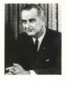 Attorney General Nicholas Katzenbach administering the oath of office to Postmaster General John A. Gronouski. February 19, 1965, 1965-02-19