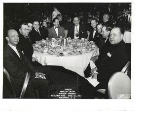 Carl Albert at an Oklahoma DAV Convention, 1970 With unidentified man at dinner. Carl is shaking hands with DAV Representative  Paul Freeman., 1970-01-01 - 1970-12-31