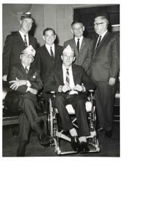Carl Albert with a disabled veteran and others., 1950-01-01 - 1976-12-31