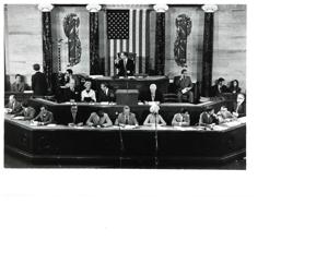 Carl Albert with John McFall, Gerald R. Ford, John Rhodes, and others standing in an office., 1974-08-21