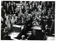 John W. McCormack speaking while Carl Albert, Mike Mansfield, and others applaud., 1950-01-01 - 1976-12-31