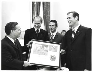Carl Albert presenting Apollo 15 plaque to astronauts David Scott, Alfred Worden, and James Irwin. Albert&#39;s staff present in speaker&#39;s office. July 26, 1971, 1971-07-26