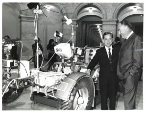 Carl Albert with unidentified man looking at the lunar rover., 1950-01-01 - 1976-12-31