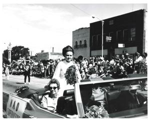 Group of people riding in a parade on Armed Forces Day in McAlester, Oklahoma. 1973, 1973-05-19