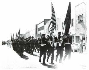Parade in McAlester, Oklahoma on Armed Forces Day. Carl Albert and Henry Bellmon are pictured in 3845, 1950-01-01 - 1976-12-31