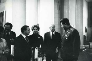 Carl Albert speaking with several unidentified people during the House delegation trip to the USSR, Romania, and Yugoslavia. August 1975, 1975-08-04