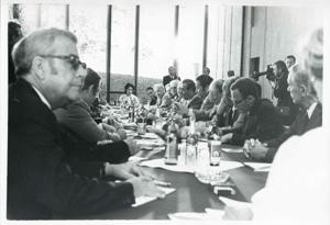 Leonid Brezhnev seated with several other people during the House delegation trip. August 1975, 1975-08-04