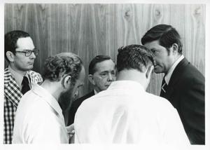 Carl Albert talking with several men. August 1975, 1975-08-04