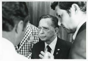 Carl Albert talking with an unidentified man., 1975-08-04