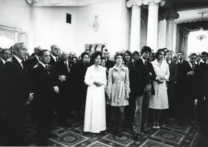 Carl Albert standing with an unidentified group of people. House delegation trip. August 1975, 1975-08-04