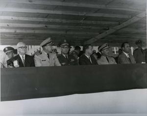 Carl Albert with military officers on a reviewing stand in McAlester, Oklahoma on Armed Forces Day. 1969, 1969-05-17