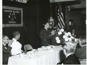 Carl Albert riding in car with naval officers in McAlester, Oklahoma on Armed Forces Day. 1970, 1970-01-01 - 1970-12-31