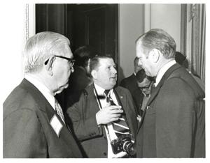 Tom Steed speaking at a 4-H Club award ceremony. Gerald R. Ford and Carl Albert to his right. Richard Hiendlmaye to his left. May 1974, 1974-05-01